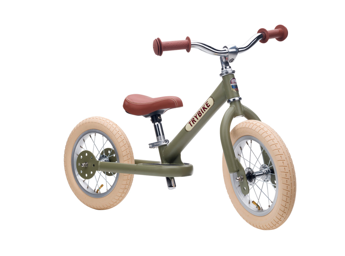 Draisienne Trybike vert vintage 2 roues, vue de trois quarts